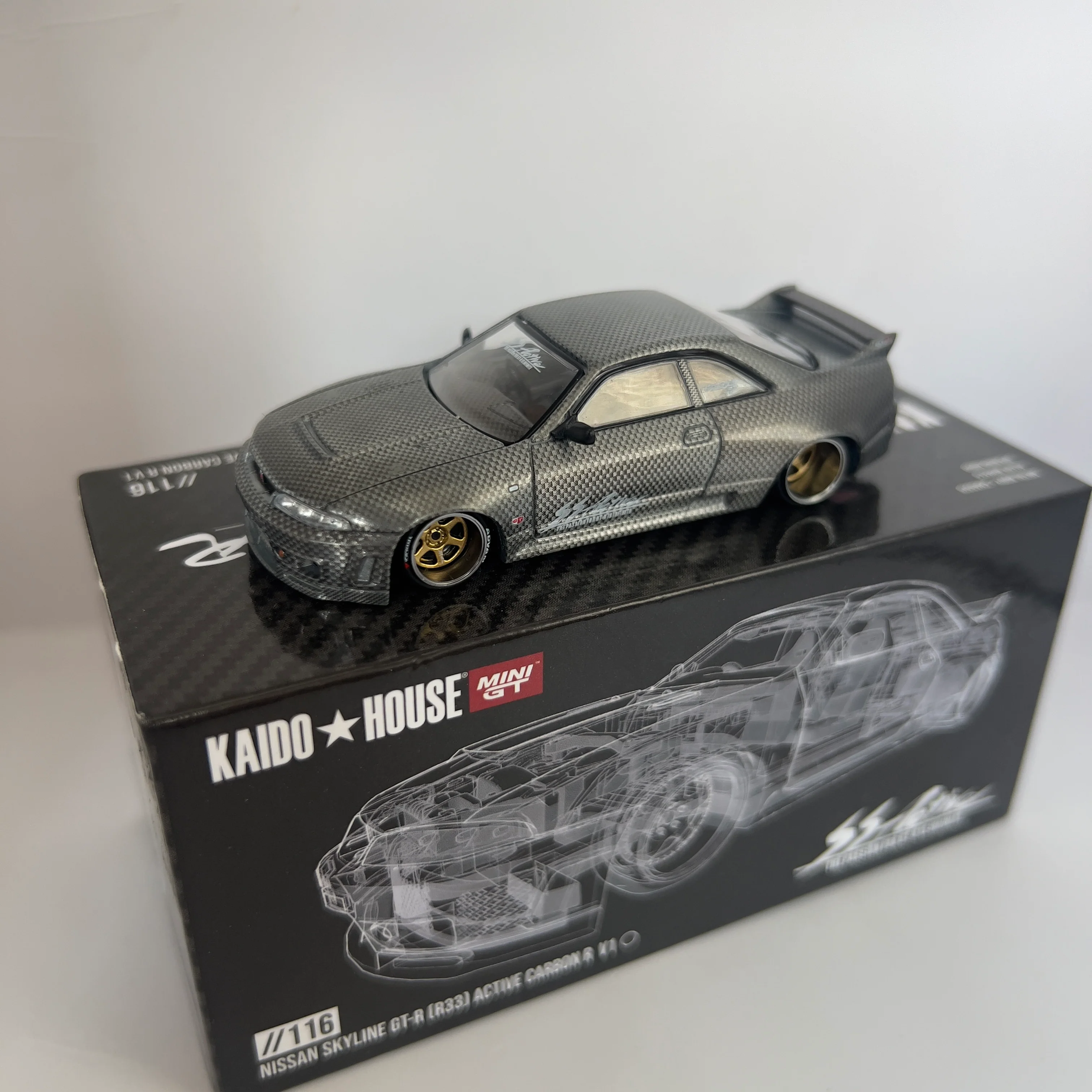 Mini GT x Kaido House Nissan Skyline R33 GTR Active Carbon V1 Chase #116 - Image 2