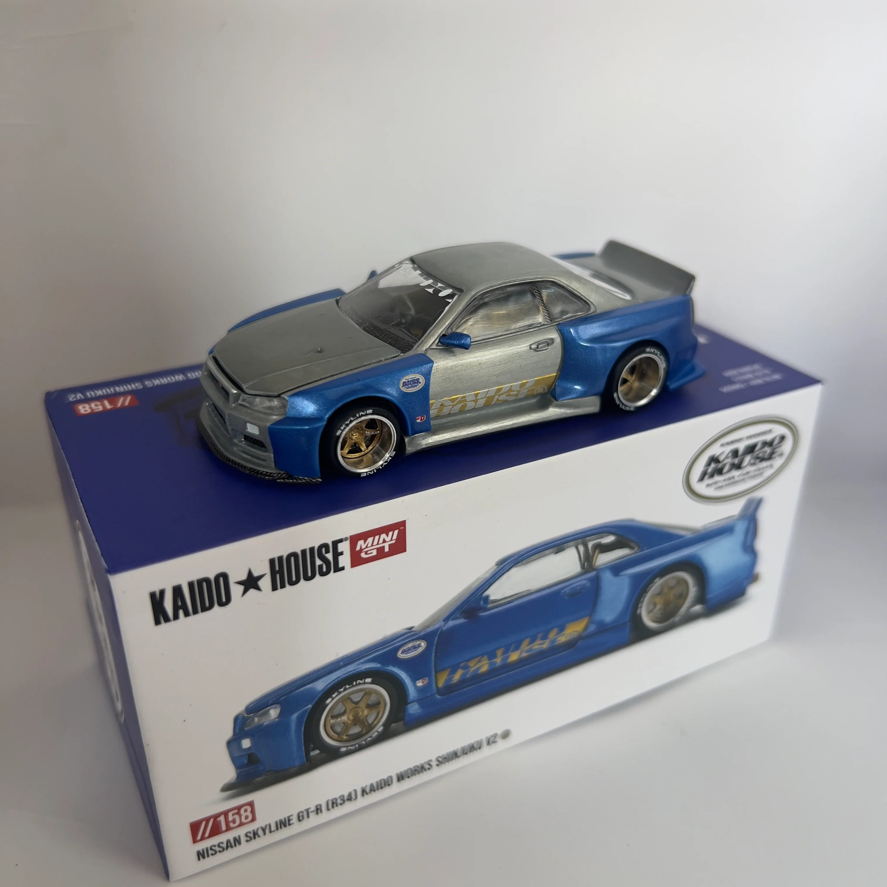 Mini GT x Kaido House Nissan Skyline R34 GTR Shinjuku V2 Chase #158 - Image 2