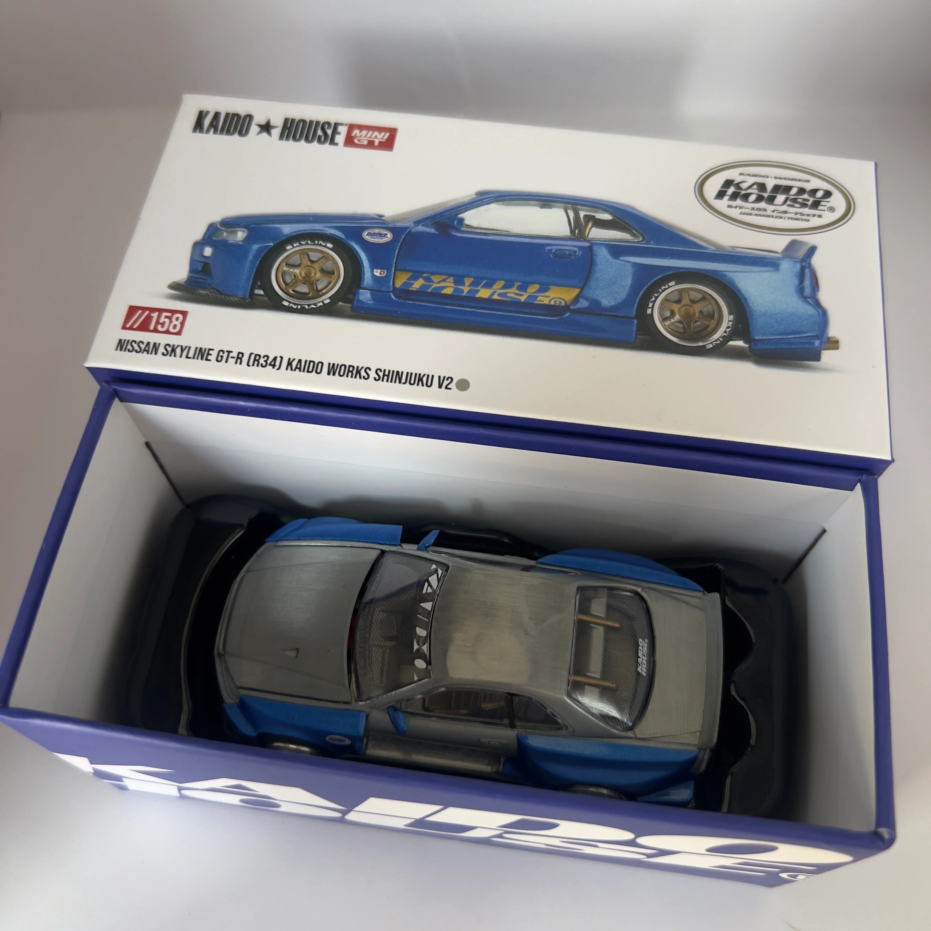 Mini GT x Kaido House Nissan Skyline R34 GTR Shinjuku V2 Chase #158 - Image 4